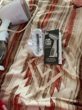 Conair handheld garment steamer used once